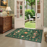Covaba boho birdsong floral garden area rug in fern green, styled in a room setting, view 9