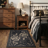 Covaba mystical snake area rug in ink black, styled in a room setting, view 13
