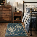 Covaba mystical snake area rug in stormy blue, styled in a room setting, view 6