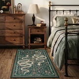 Covaba mystical snake area rug in fern green, styled in a room setting, view 9