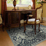 Covaba vintage woodcut forest and rabbit area rug in pearl grey, styled in a room setting, view 3