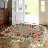 Covaba boho modern parisian floral scalloped doormat in coffee brown, styled in a room setting