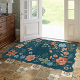 Covaba boho modern parisian floral scalloped area rug in deep navy, styled in a room setting, view 9