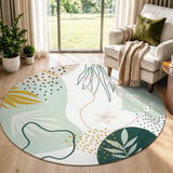 Covaba modern botanical leaf round rug in fern green, styled in a room setting, view 5