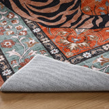 Covaba wild tiger rug in burnt rust, styled in a room setting