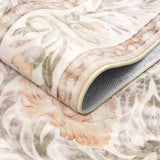 Covaba vintage floral rug in blush clay, styled in a room setting, view 2