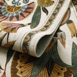 Covaba egyptian-inspired botanical rug in ivory cream, styled in a room setting
