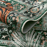 Covaba wild tiger rug in fern green, styled in a room setting, view 2