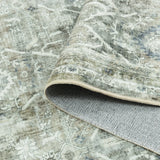 Covaba vintage rug in fern green, styled in a room setting
