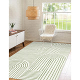 Covaba abstract rainbow stripe green/white area rug in fern green, shown flat on a plain ivory backdrop, view 5