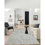 Covaba abstract rainbow stripe black/beige area rug in warm beige, shown flat on a plain ivory backdrop, view 7