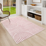 Covaba abstract rainbow stripe pink/white area rug in blush clay, styled in a room setting, view 9