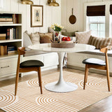 Covaba abstract rainbow stripe orange/white area rug in amber clay, styled in a room setting, view 4