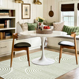 Covaba abstract rainbow stripe green/white area rug in fern green, styled in a room setting, view 3
