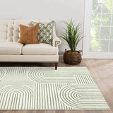 Covaba abstract rainbow stripe green/white area rug in fern green, styled in a room setting, view 4
