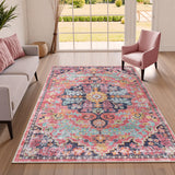 Covaba bohemian floral medallion area rug in faded rose, styled in a room setting, view 13