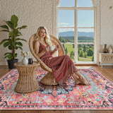 Covaba bohemian floral medallion area rug in faded rose, styled in a room setting, view 18