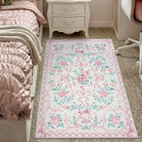 Covaba floral bows area rug in blush clay, styled in a room setting, view 5