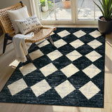 Covaba modern geometric diamond checkered area rug in ink black, styled in a room setting, view 12