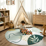 Covaba modern botanical leaf round rug in fern green, styled in a room setting, view 4