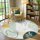 Covaba modern botanical leaf round rug in fern green, styled in a room setting