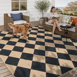 Covaba geometric checkered easy jute indoor/outdoor area rug in ink black, styled in a room setting, view 5