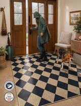Covaba geometric checkered easy jute indoor/outdoor area rug in ink black, styled in a room setting, view 3