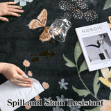Covaba boho modern parisian floral scalloped rug in ink black, styled in a room setting, view 4