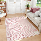 Covaba abstract rainbow stripe pink/white area rug in blush clay, styled in a room setting, view 5