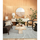 Covaba abstract rainbow stripe black/beige area rug in warm beige, shown flat on a plain ivory backdrop, view 5
