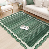 Covaba modern abstract bordered scalloped area rug in fern green, styled in a room setting