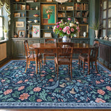 Covaba maximalism vibrant floral area rug in stormy blue, styled in a room setting, view 3