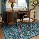 Covaba maximalism vibrant floral area rug in teal haze, styled in a room setting, view 5