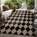 Covaba geometric checkered easy jute indoor/outdoor area rug in coffee brown, styled in a room setting, view 9