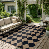 Covaba geometric checkered easy jute indoor/outdoor area rug in coffee brown, styled in a room setting, view 11