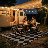 Covaba geometric checkered easy jute indoor/outdoor area rug in coffee brown, styled in a room setting, view 13
