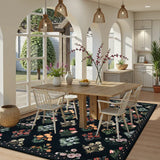 Covaba meadow floral area rug in ink black, styled in a room setting, view 7
