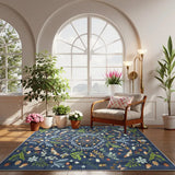 Covaba boho insect botanical floral area rug in stormy blue, styled in a room setting, view 4