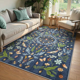 Covaba boho insect botanical floral area rug in stormy blue, styled in a room setting, view 3