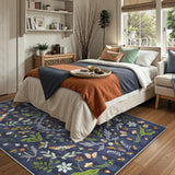 Covaba boho insect botanical floral area rug in stormy blue, styled in a room setting, view 5