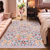 Covaba maximalism vibrant blossom floral area rug in blush clay, styled in a room setting, view 5
