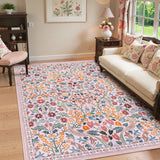 Covaba maximalism vibrant blossom floral area rug in blush clay, styled in a room setting, view 4