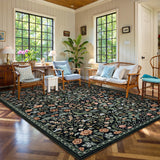 Covaba maximalism vibrant blossom floral area rug in ink black, styled in a room setting, view 15