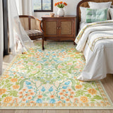 Covaba maximalism vibrant floral area rug in sage mist, styled in a room setting, view 8