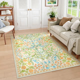 Covaba maximalism vibrant floral area rug in sage mist, styled in a room setting, view 6