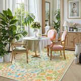 Covaba maximalism vibrant floral area rug in sage mist, styled in a room setting, view 7