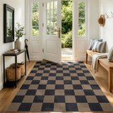 Covaba checkered easy jute indoor/outdoor area rug in coffee brown, styled in a room setting, view 10