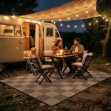 Covaba checkered easy jute indoor/outdoor area rug in dune khaki, styled in a room setting, view 2