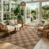 Covaba checkered easy jute indoor/outdoor area rug in dune khaki, styled in a room setting, view 4