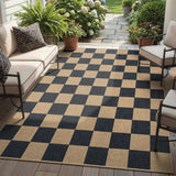 Covaba checkered easy jute natural indoor/outdoor area rug in ink black, styled in a room setting, view 7